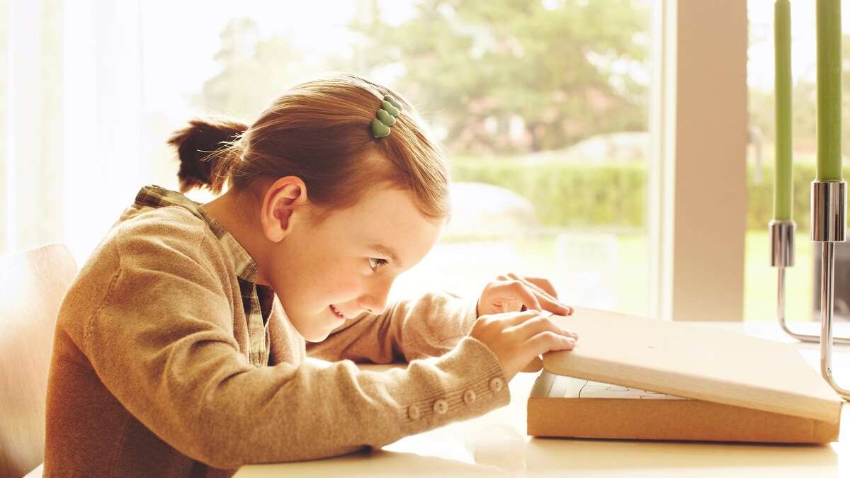Girl opens parcel